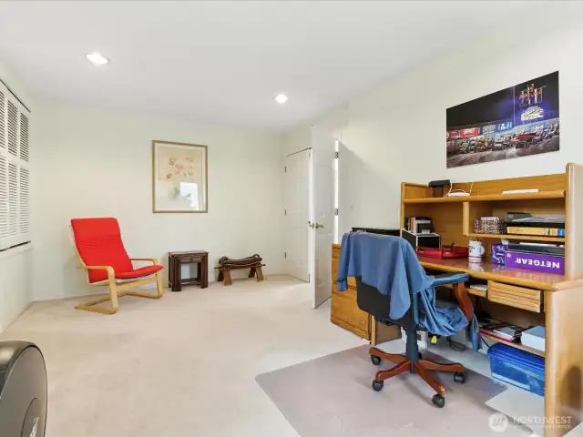 Currently an office area.  The shutters to the leftr open to a closet area and could be utilize as another bedroom.