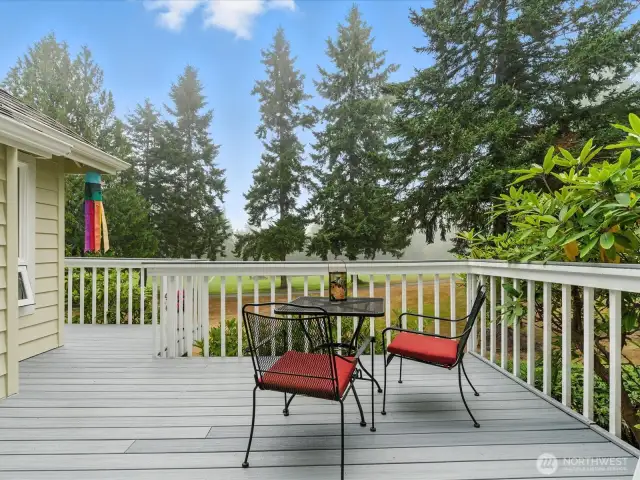 Trex decking wrap around with plenty of seating area for relaxing and enjoying the views of golf course, pond and the wildlife that abound in Port Ludlow.