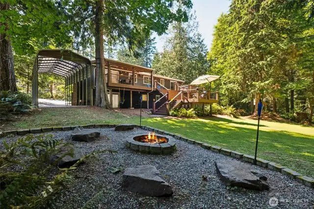 In addition, the home has a large covered carport on one side of the house which easily fits a large RV or Boat. Paved parking as well, and the driveway and parking areas were just resealed a month ago!