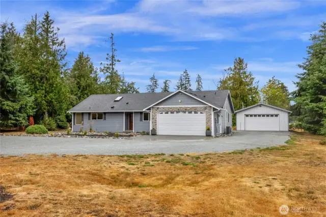Front of home - Level lot with TONS of parking