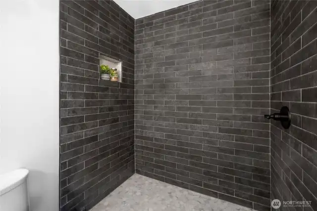 Updated primary shower (Glass door will be installed)