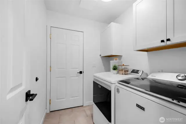 Updated laundry with heated flooring