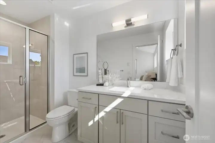 Primary bath with large tiled shower