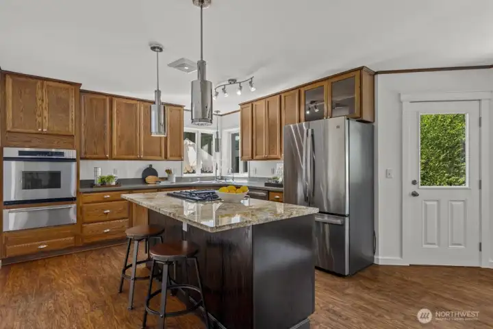 The gas stovetop is ready for your favorite recipes.