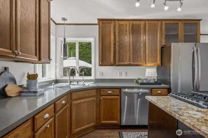 Ample cabinetry provides smart storage for all your kitchen must-haves.