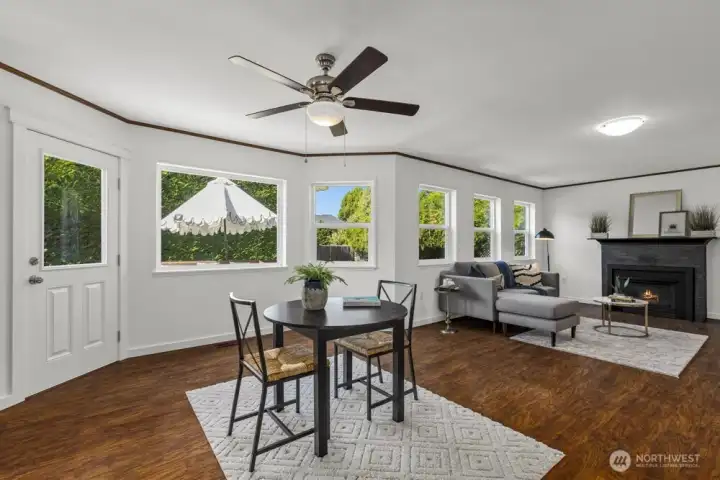 And the natural light continues with walls of windows that bring the outdoors in.