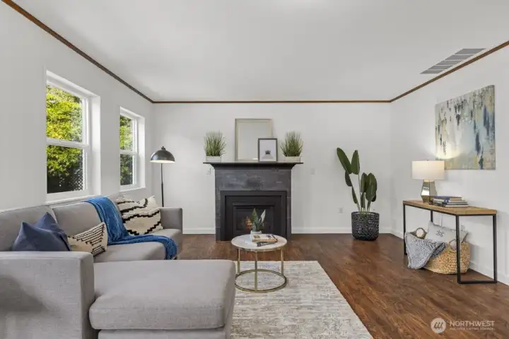 The family room invites you to relax by the gas fireplace—cozy & welcoming.