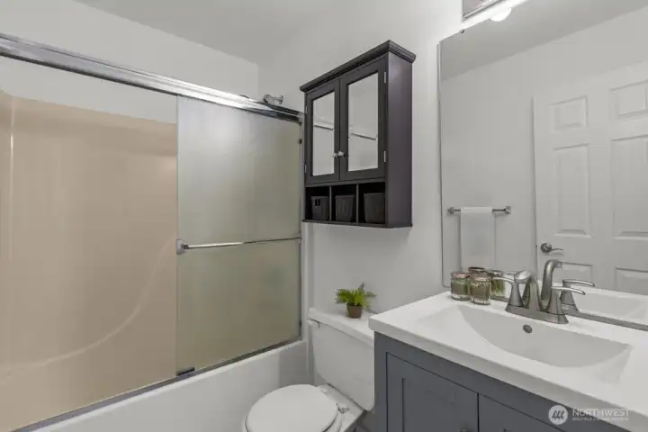 With an additional full bath upstairs, there’s space and comfort for everyone.