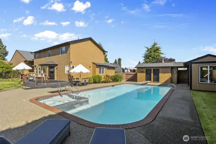 Heated pool and bubbling hot tub for year-round enjoyment.