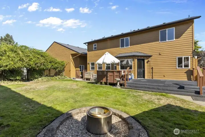 And as if that weren’t enough, the backyard also features an arbor wrapped in lush greenery, which welcomes you into the "secret" garden.