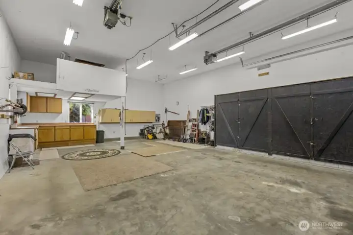 With its size and setup, the detached shop has the potential to become a DADU, creating space for guests or additional income.