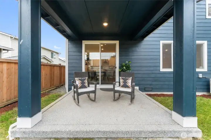 Alternate view of the covered patio, ideal for dining or relaxing outdoors.