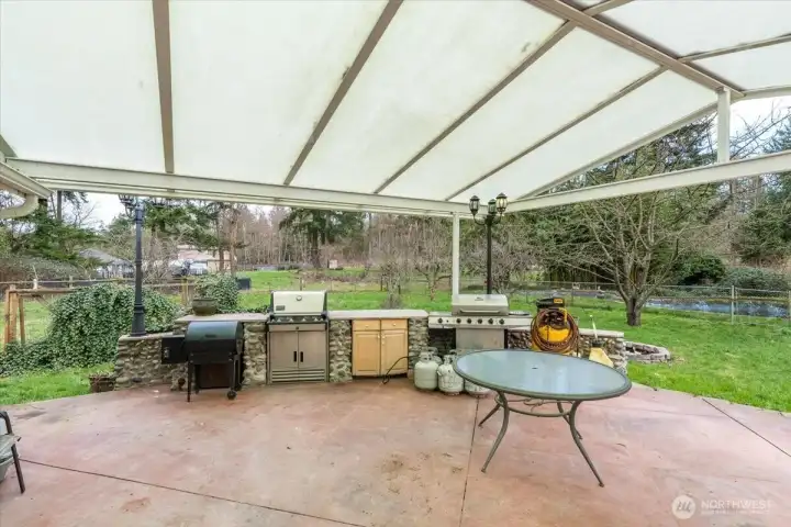 Unit B - Cover front porch with outdoor kitchen.