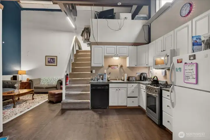 Office that is situated on the back portion of the shop with its own entrance, 3/4 bathroom, kitchenette & bonus room. This space is currently rented $1800 per month.