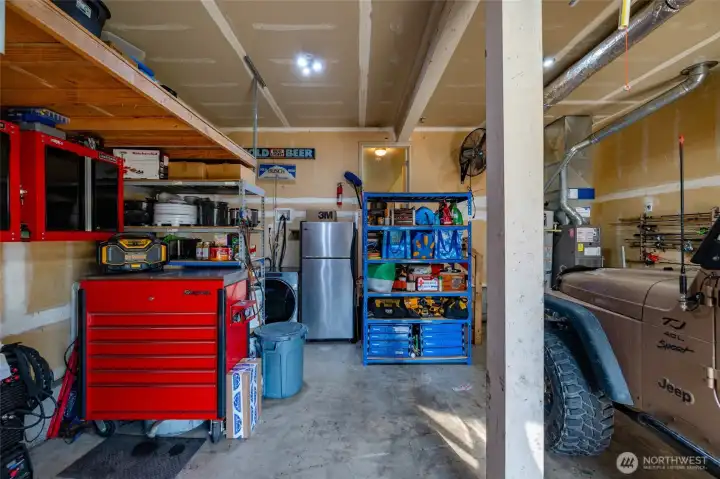 Washer and Dryer located in Garage