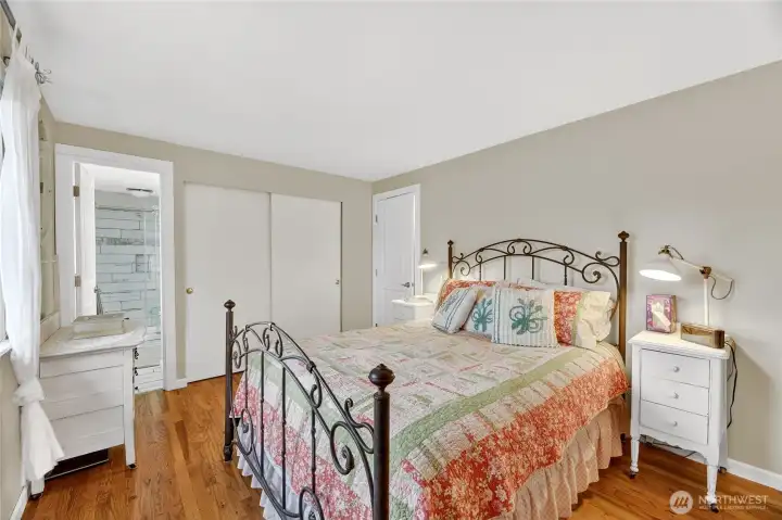 PRIMARY SUITE   Views of rear yard  Closet with double hanging rods for extra storage