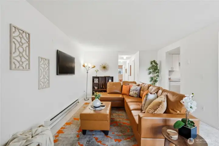 Harmonious blend of cozy living spaces and open design creates a welcoming atmosphere throughout.