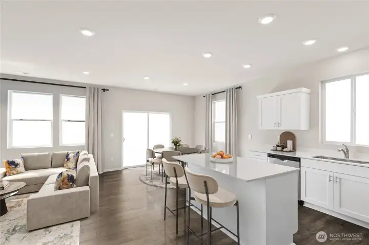 Open kitchen and family room concepts. Laminate flooring on the main level. Pictures are for representation only colors and options may vary.