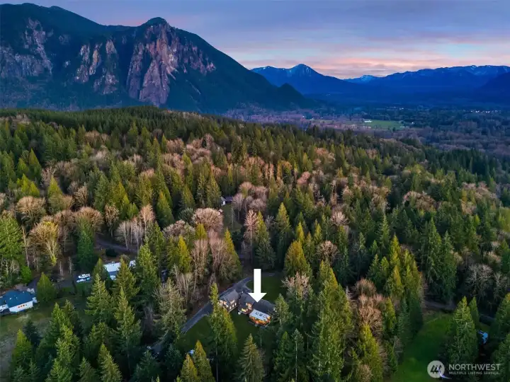 Nestled in the Snoqualmie Valley on a sunny 7+ Acres is your very own compound!