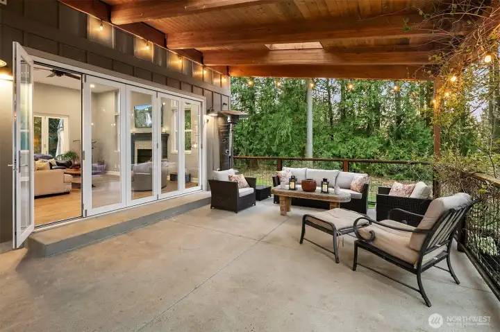 Facing the backyard is the covered deck with seating (you are only seeing 1/2 of it here)