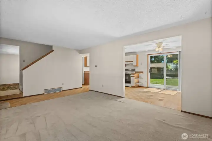 Easy flow from living to kitchen and out back.