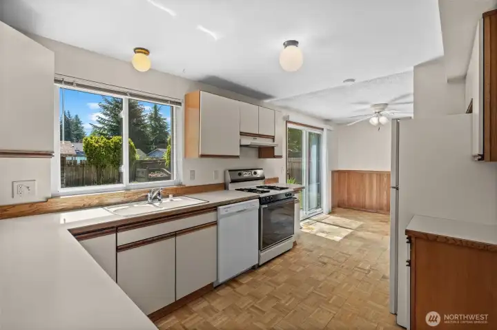 Kitchen opens to the dining area.