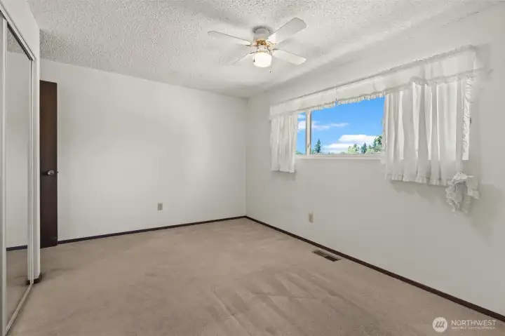Bedroom #4 - Lots of window and a roomy closet.