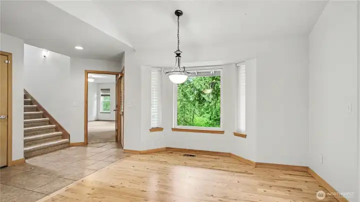 Dedicated dining area, subtly separated from the living room.