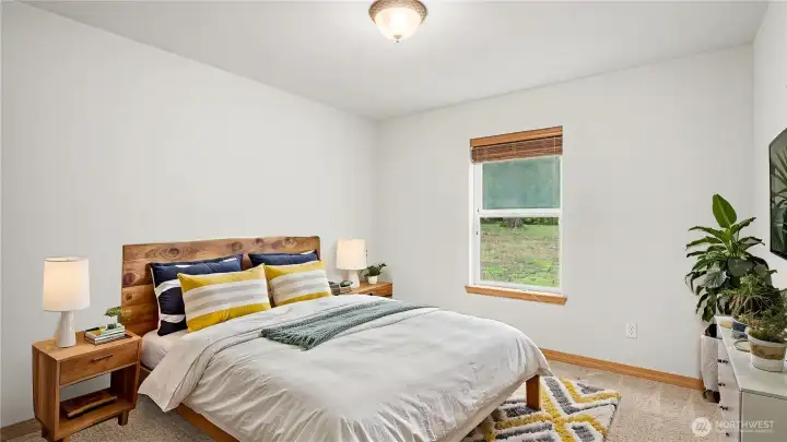 Main floor guest bedroom. *Virtually Staged*