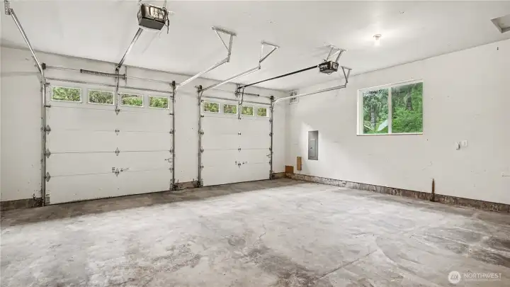 Spacious two-car garage with individual doors.