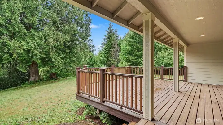 Enjoy outdoor living in any season on the beautiful partially covered deck.