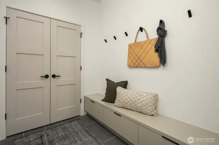 Mudroom style entry off garage entrance. Mudroom style entry off garage entrance.