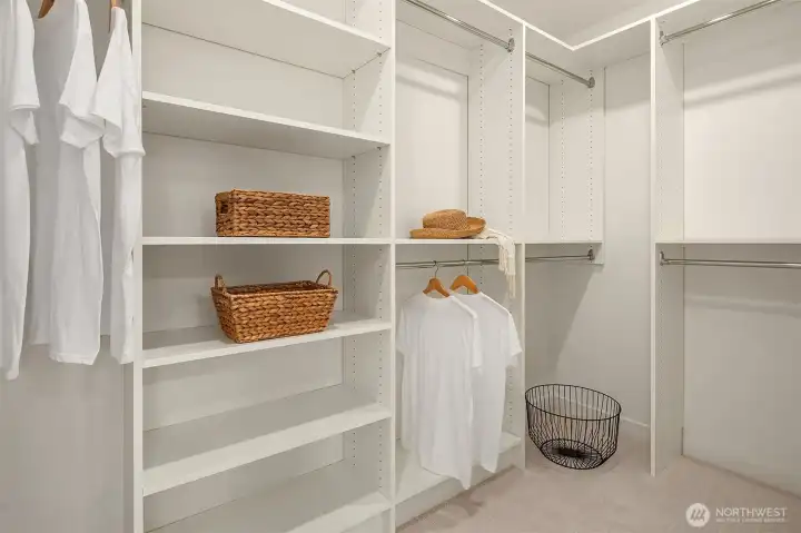 Spacious walk-in closet. Spacious walk-in closet.