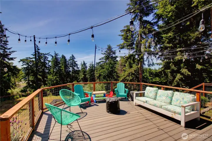 Enjoy the sunsets from your deck overlooking your gardens and yard