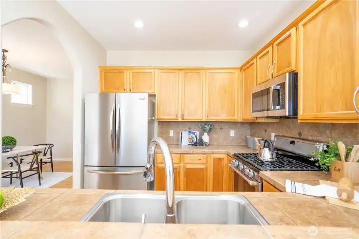 Kitchen with stainless steel appliances.