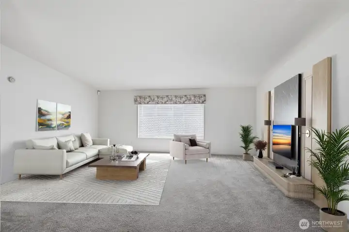 Spacious living room area will easily accommodate recliners, sofas, coffee tables and big screen TV. Large vinyl window brings in notable natural lighting. Virtyally staged.