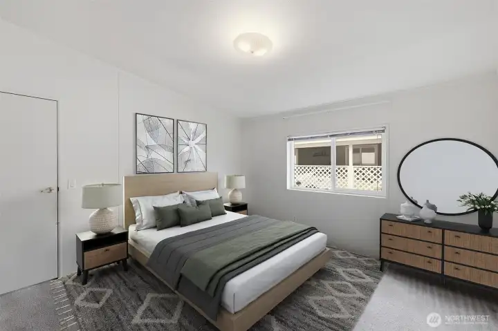 Primary suite located on the North end of the home. Room will easily accommodate a king size bed and additional furniture. Double closets for all your shoes, clothes etc. Virtually staged.