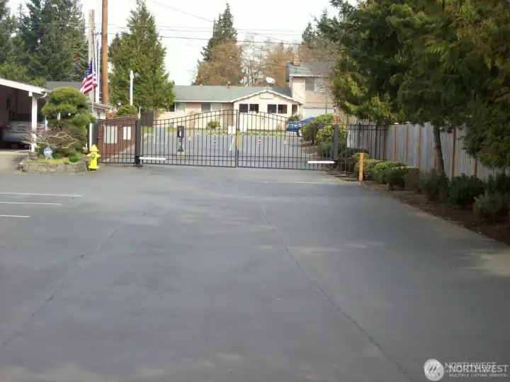 Gated entry for vehicles and foot traffic.