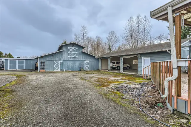 Large barn & 3 car garage (add doors) with fully finished office.