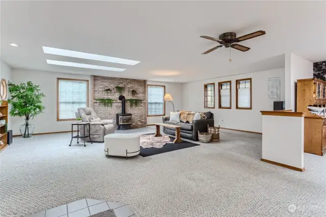 Spacious living room w/ cozy gas stove