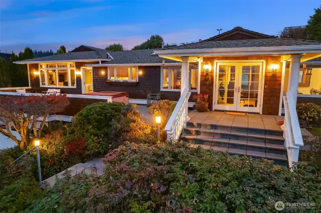 Innis Arden 1-level home brimming with charm; shingle-style architecture, multiple outdoor entertaining & play spaces, and stunning views.