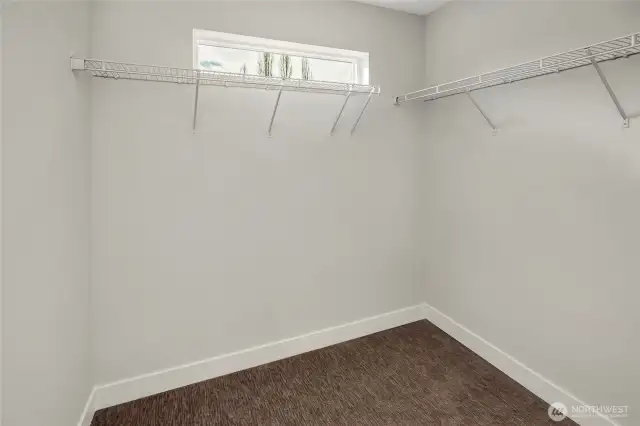 Walk-in Closet With Clean White Wire Shelving