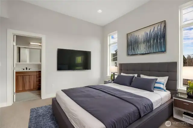 Great Views From Soaring Windows In Primary Bedroom  Virtually staged