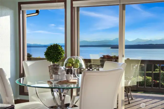 The eating area off the kitchen with sliding doors to an entertainment sized deck.