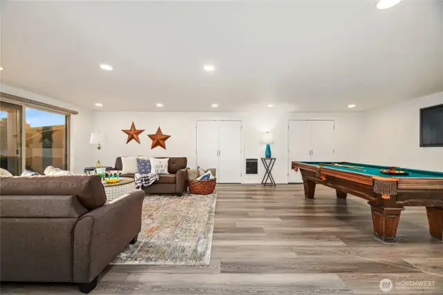 Another view of the rec room with pool table.
