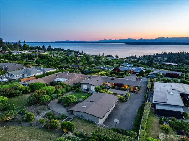 The level back yard has plenty of room for garden beds and play areas.