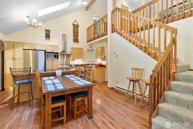 Vaulted ceilings w/ ceiling fan & stairs up to Loft / 3rd bedroom