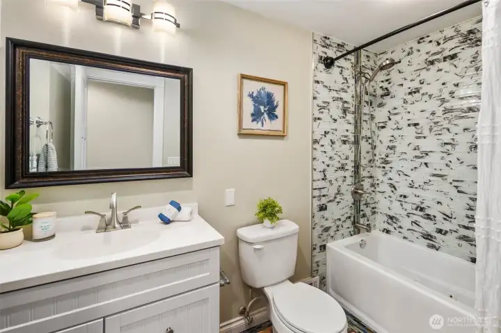 Bathroom #2 - Updated with attractive new tile and vanity