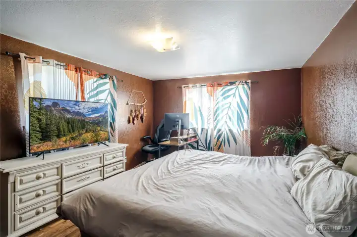 Main floor bedroom with Hardwood flooring