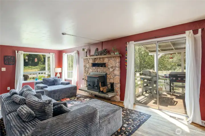 Nice window lighting in the Vamily room with access to the covered deck